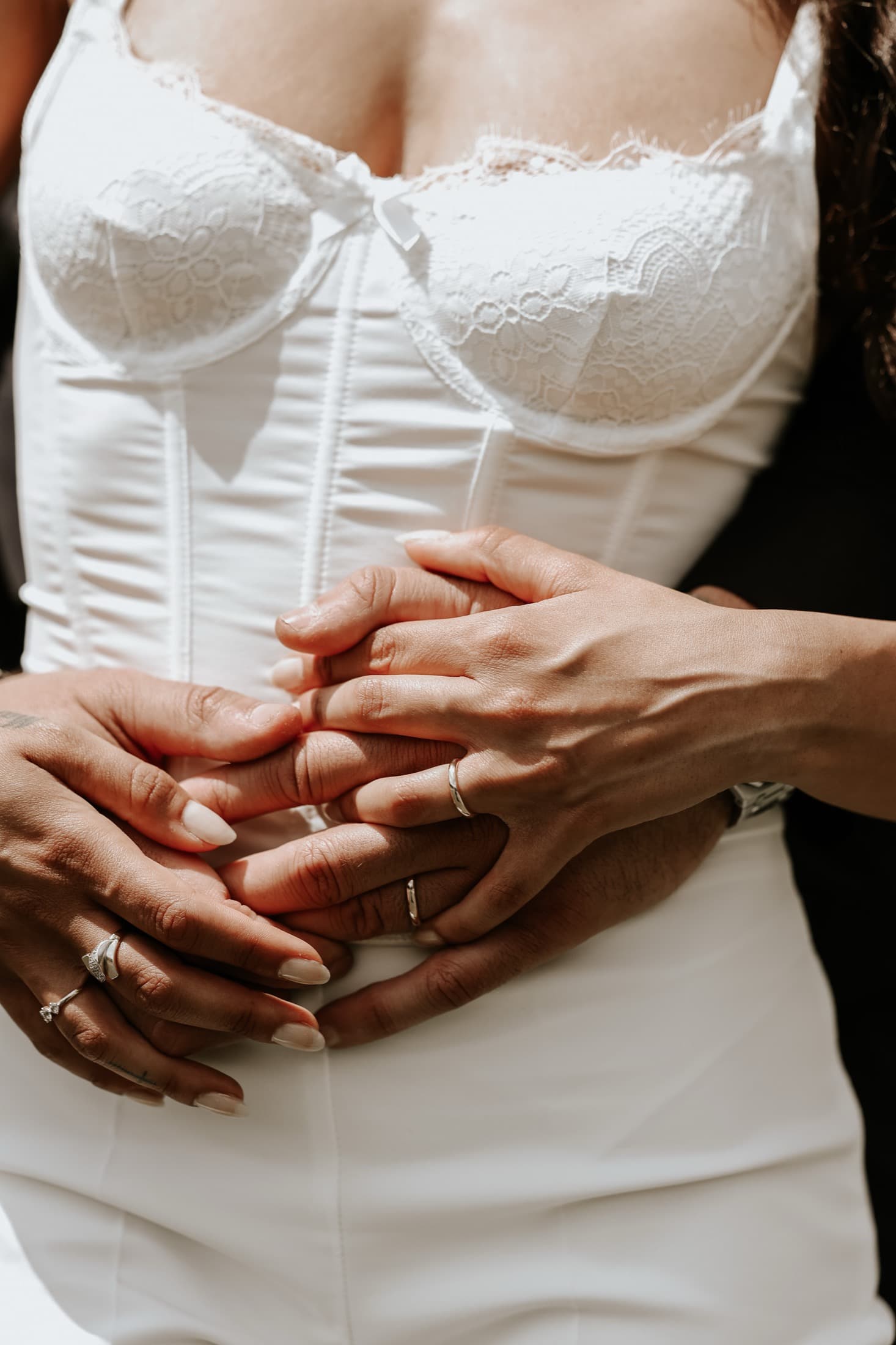 Close embrace, hands detail
